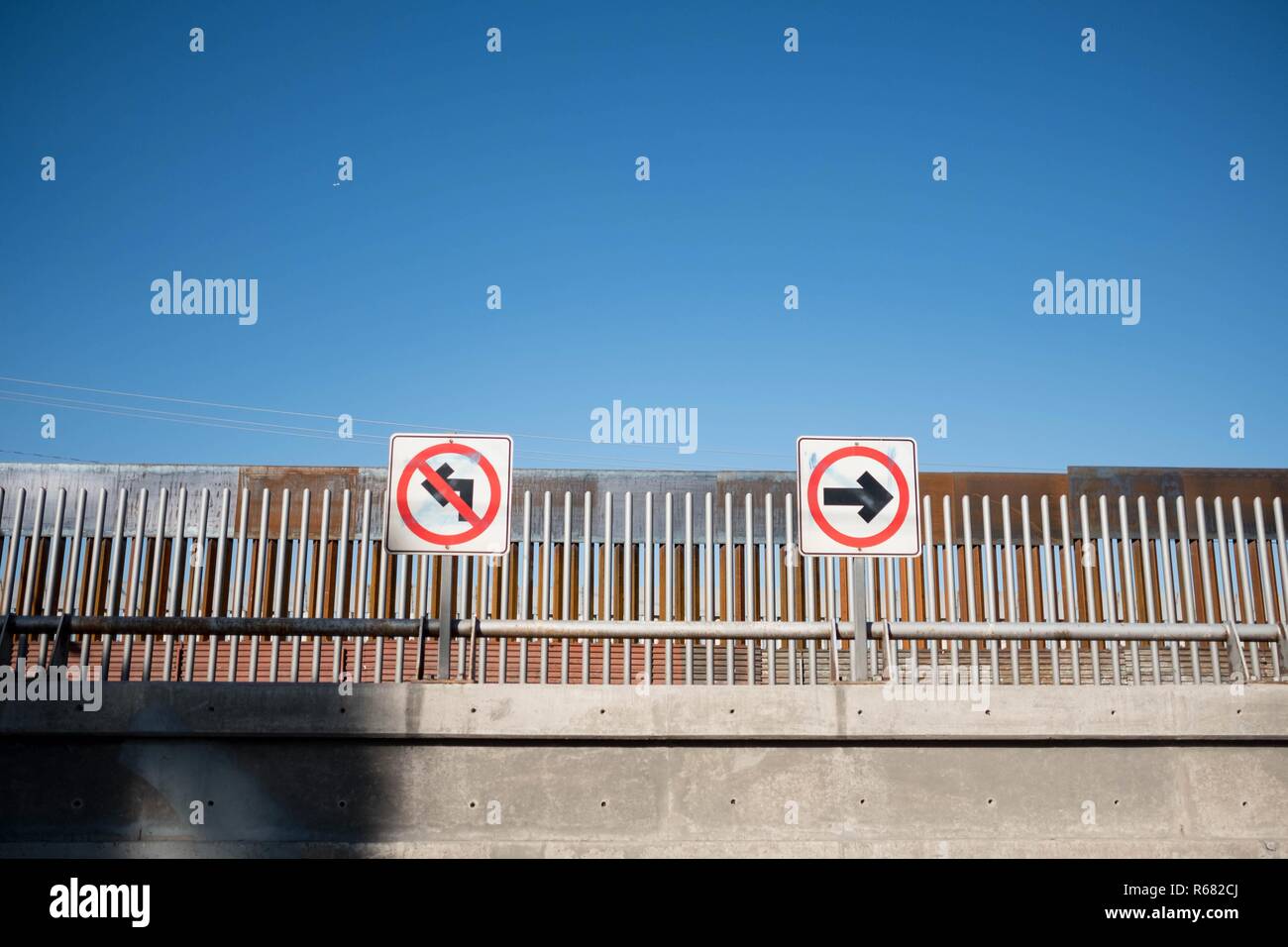 The United States boarder wall is seen next to the now closed sports complex migrant camp. Around 6,000 migrants are staying in a new temporary shelter where they wait for asylum in the United States. Stock Photo
