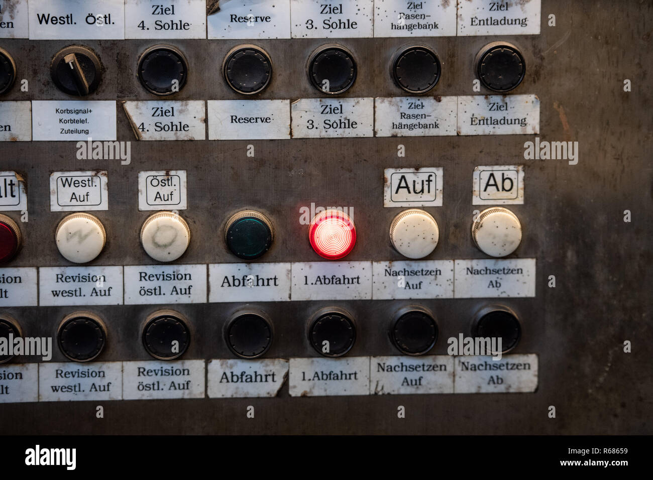 04 December 2018, North Rhine-Westphalia, Ibbenbüren: Different switches can be seen on a control panel for the pit cage. Subsidised coal mining in Germany will be phased out at the end of 2018. The last colliery, Prosper Haniel, closes on 21.12. in Bottrop. Photo: Bernd Thissen/dpa Stock Photo
