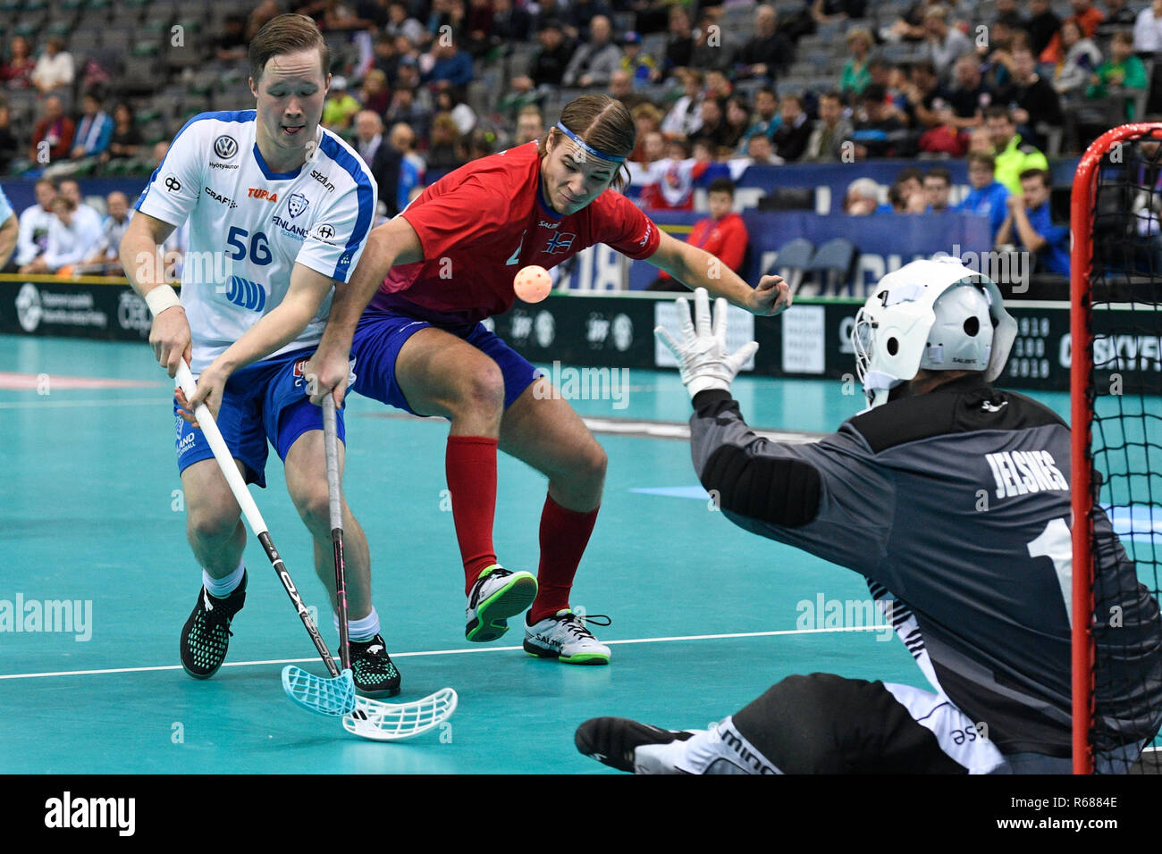 Prague, Czech Republic. 04th Dec, 2018. From left KRISTER SAVONEN of Finland, MARTIN ISNES KVISVIK of Norway and goalie of Norway MARKUS JELSNES in action during the Men's World Floorball Championship, group B match Finland vs Norway, played in Prague, Czech Republic, on December 4, 2018. Credit: Michal Kamaryt/CTK Photo/Alamy Live News Stock Photo