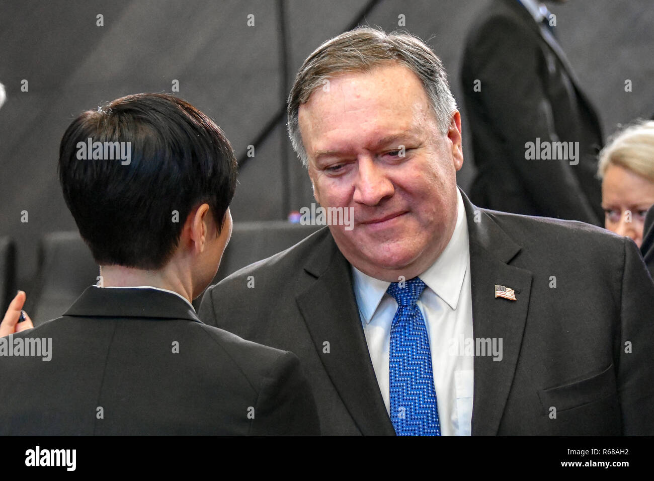 Brussels, Belgium. 4th Dec 2018. U.S. Secretary State Mike Pompeo, right, chats with Norwegian Foreign Affairs Ine Eriksen Soreide before the start of the North Atlantic Council meeting on Georgia and Ukraine at NATO headquarters December 4, 2018 in Brussels, Belgium. Credit: Planetpix/Alamy Live News Stock Photo