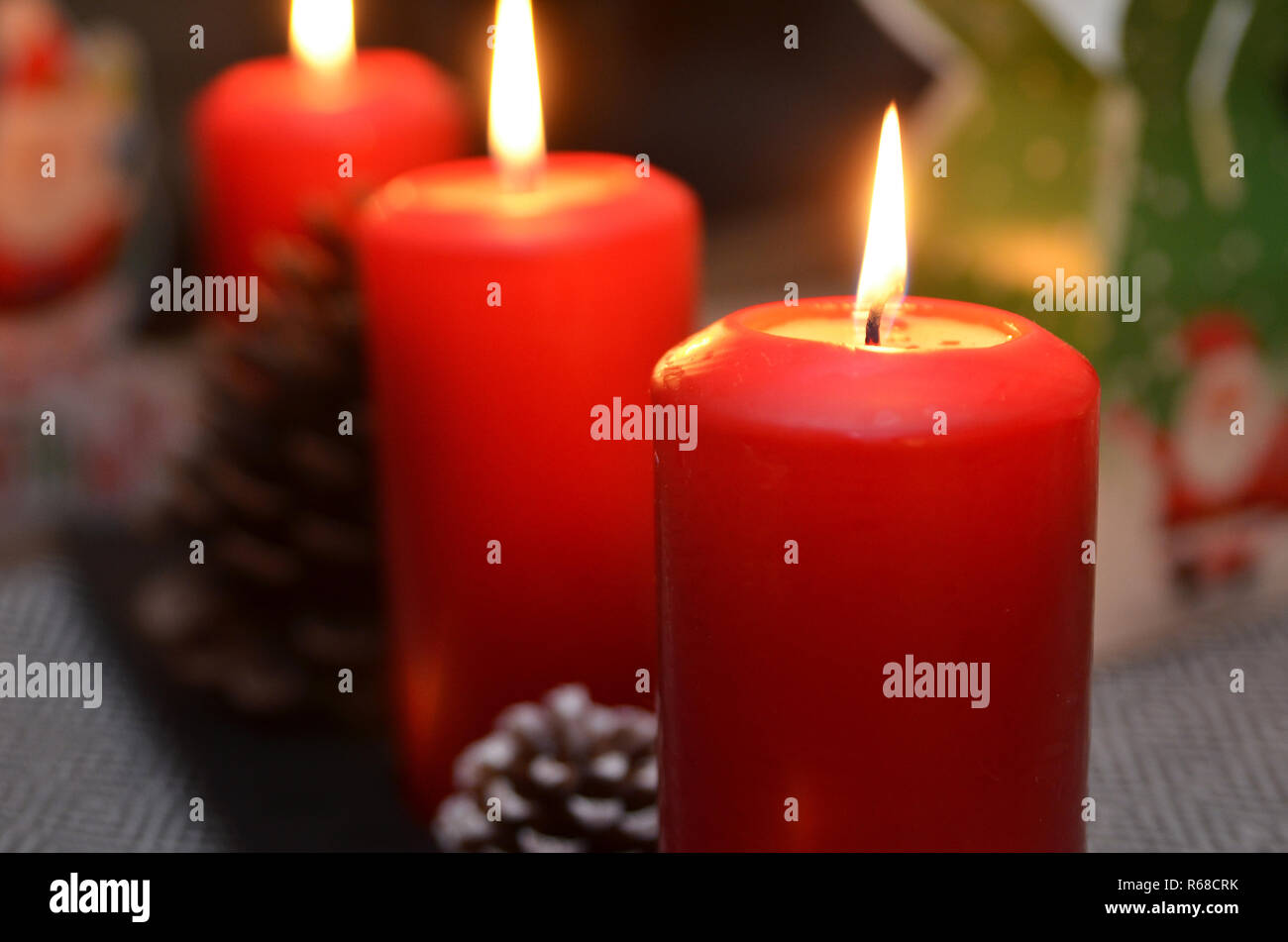 Christmas candle burning at night Stock Photo Alamy