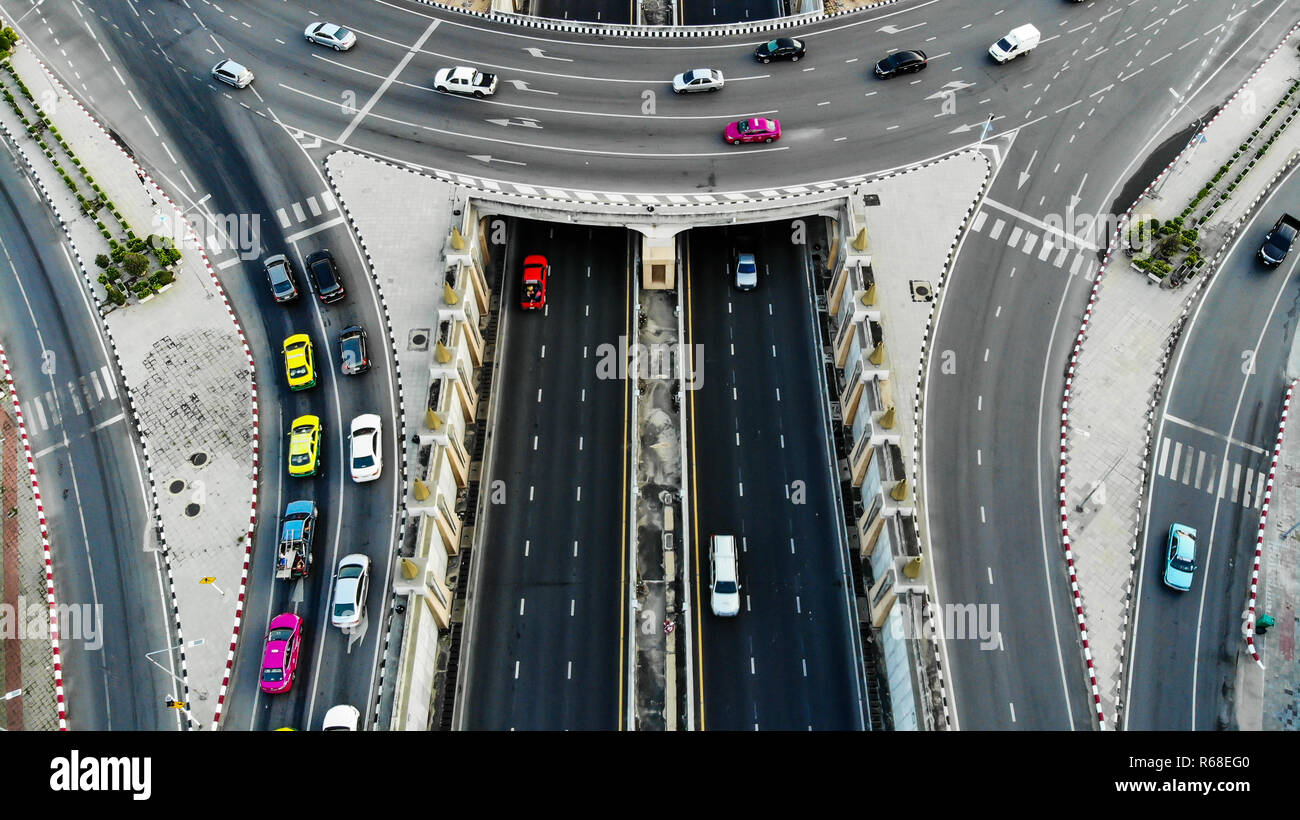 Aerial view of traffic on city streets in daylight. Traffic is streamlined and runs at limit speed. Stock Photo
