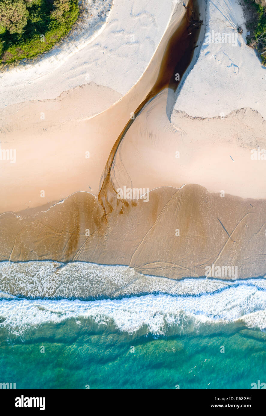 Beautiful aerial view of the ocean, white sand and peaceful landscape Stock Photo