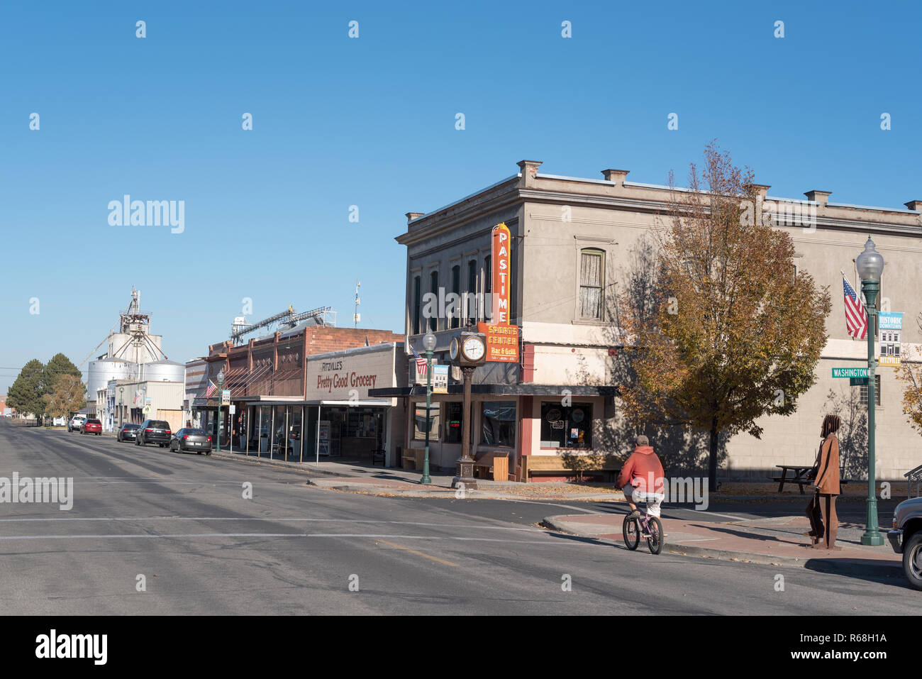 Riding a bicycle in downtown Ritzville, Washington Stock Photo Alamy