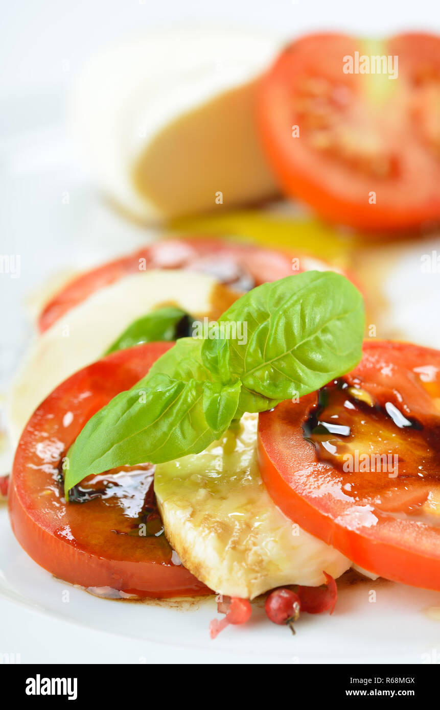 Salad of tomato and mozzarella with basil and balsamic vinegar and