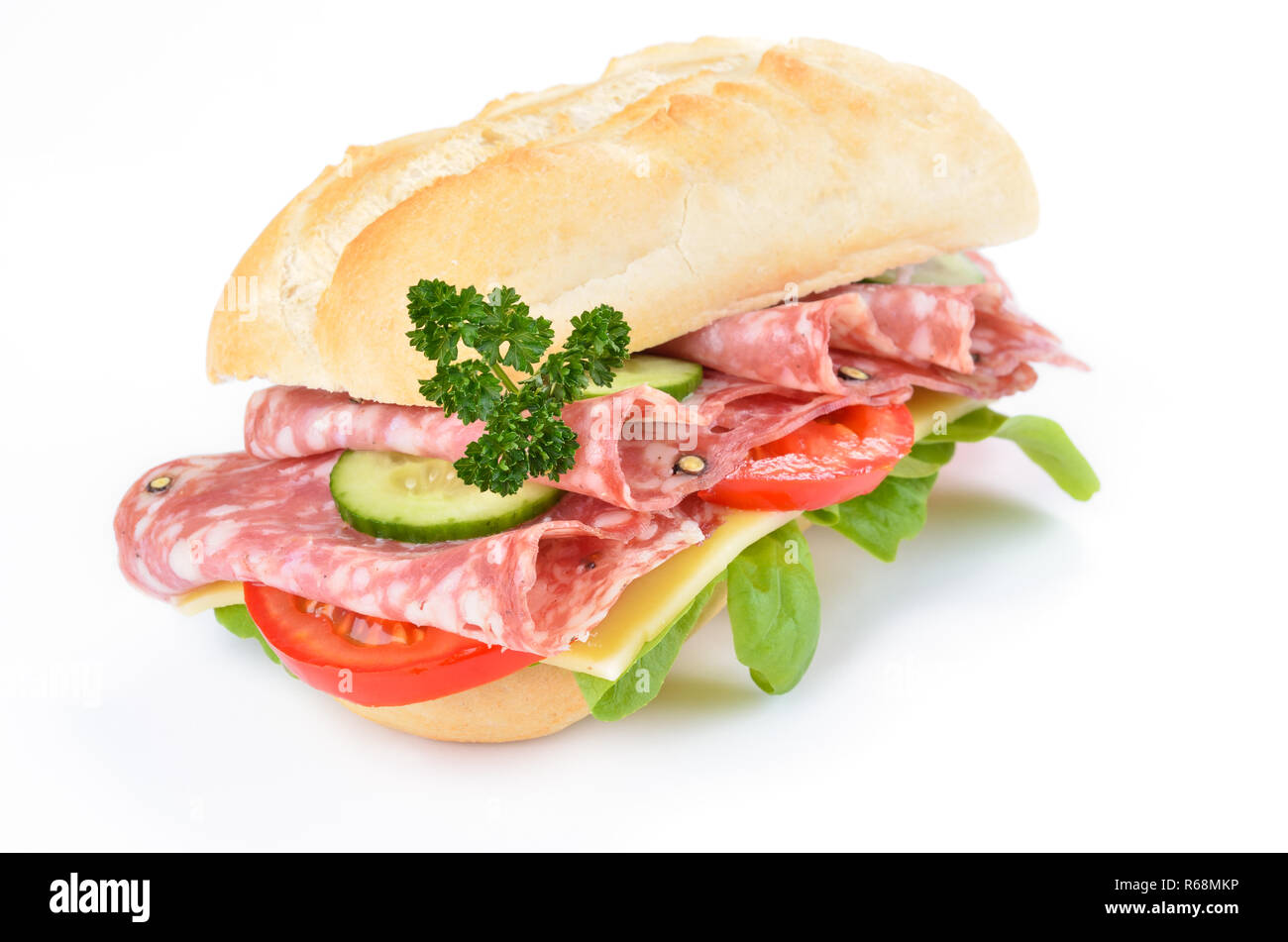 Sandwich with Italian salami, cheese, tomato, cucumber and lettuce