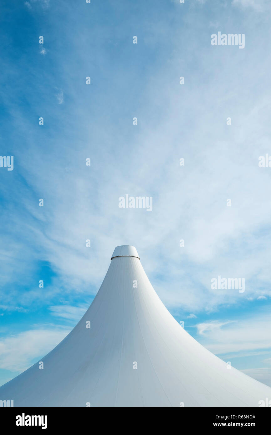 White detail of big top tent against a blue an cloudy sky, Alicante,Costa Blanca, Spain,Europe Stock Photo