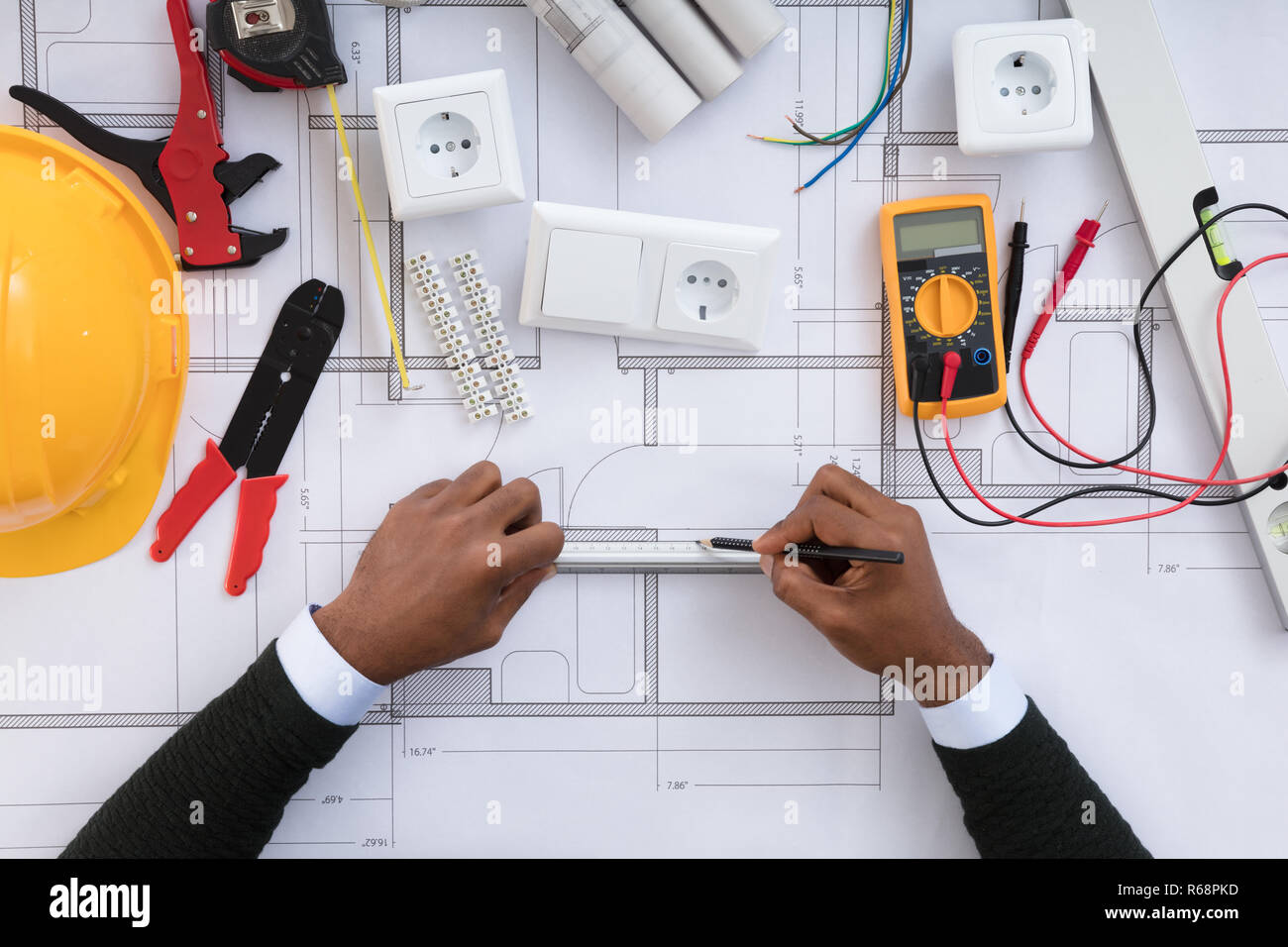 Architect Drawing Plan On Blueprint Stock Photo Alamy