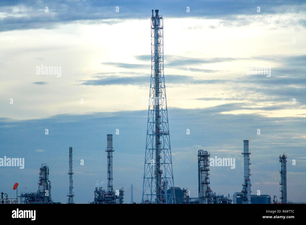 Oil refinery with evening sky Stock Photo - Alamy
