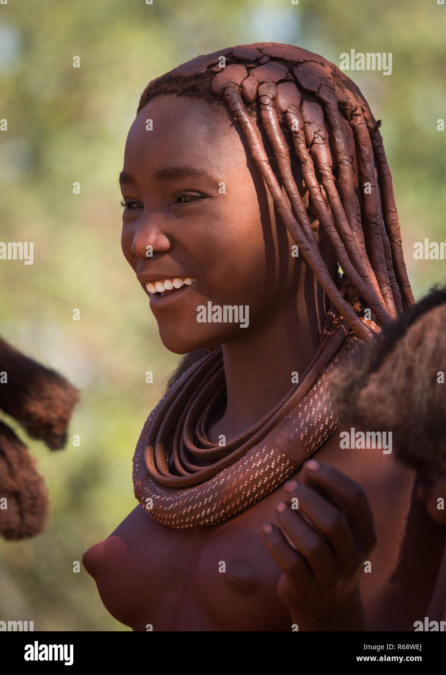 Himba tribe young woman, Cunene Province, Oncocua, Angola Stock Photo