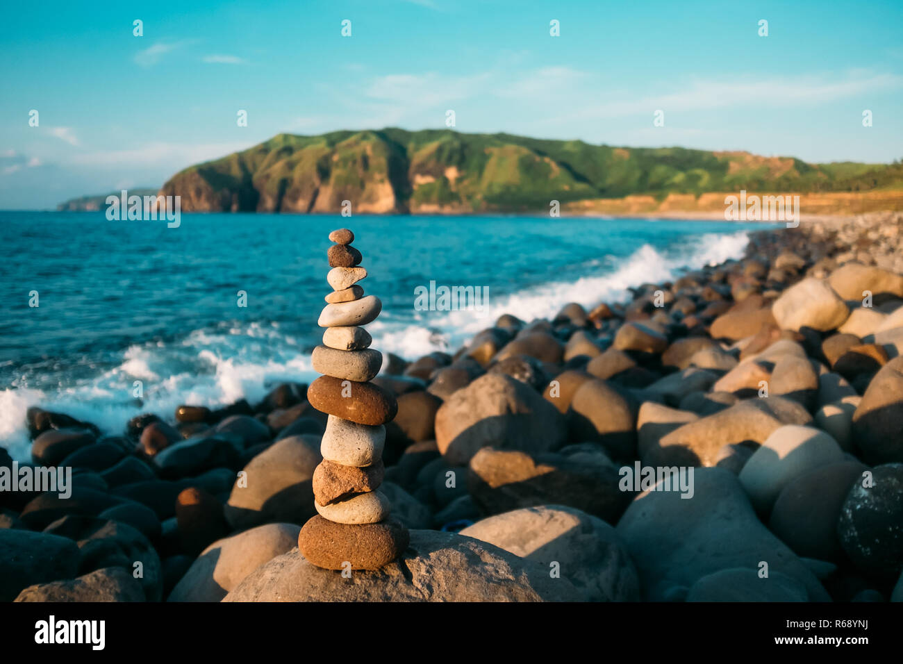 Stone Balancing in the province of Batanes, Philippines Stock Photo