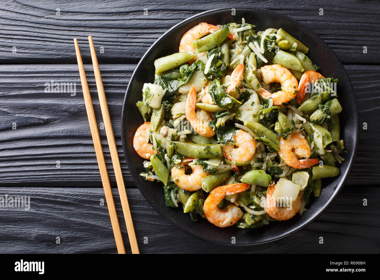 Delicious peeled king prawns with a refreshing mix of pak choi, spinach