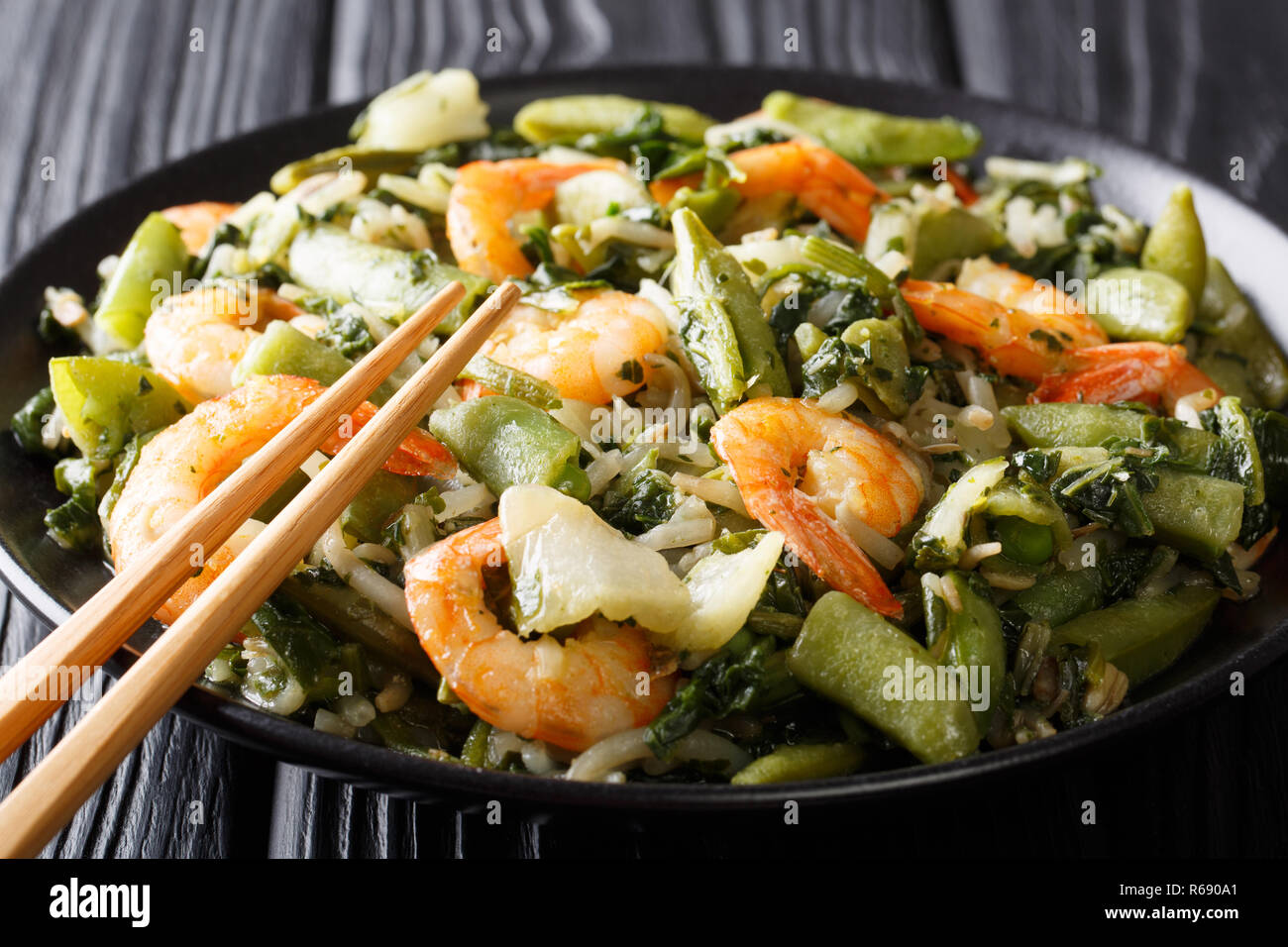 Delicious peeled king prawns with a refreshing mix of pak choi, spinach