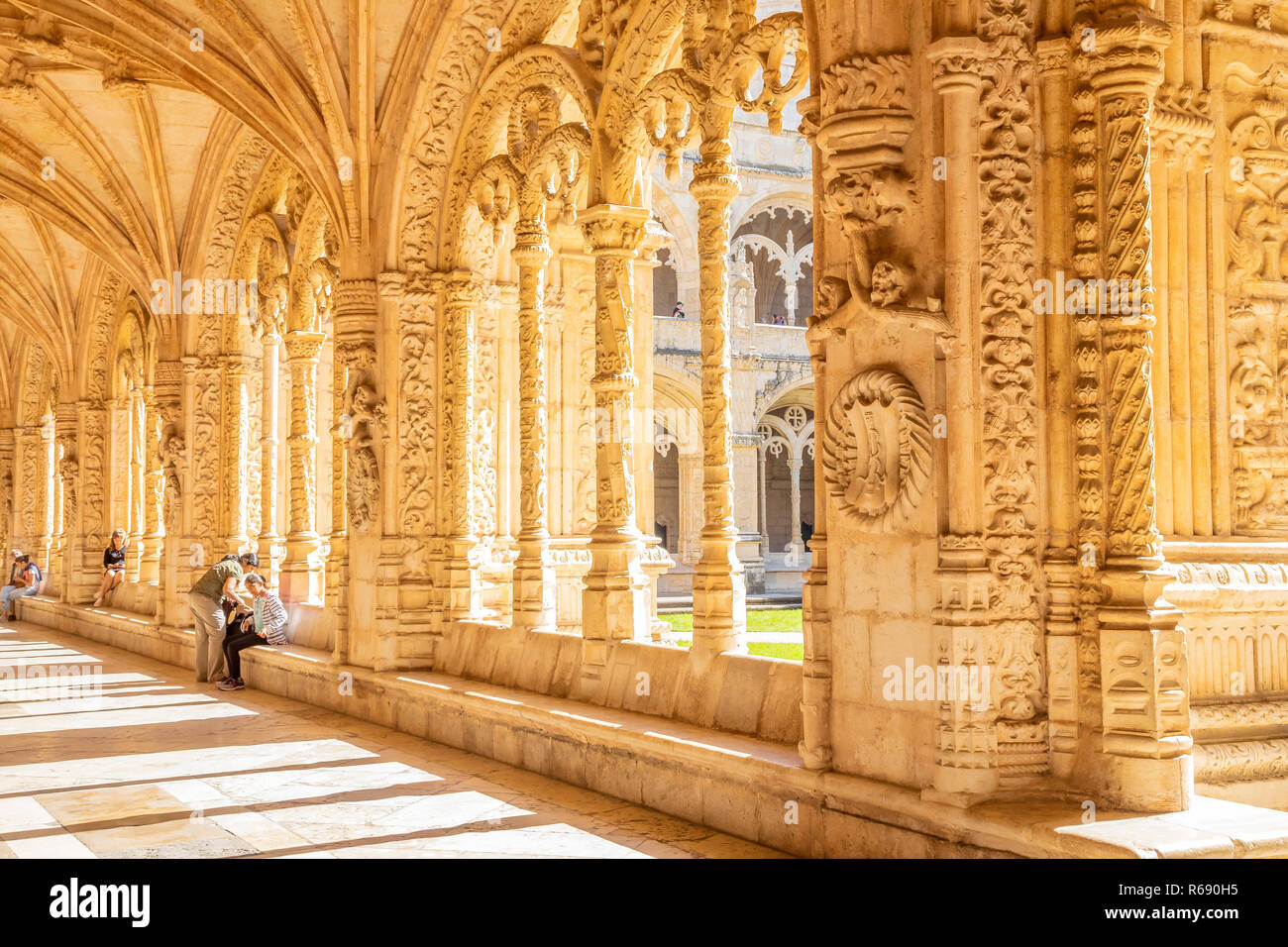 Tourists inside S. Jeronimos monastery in Lisbon, Portugal Stock Photo