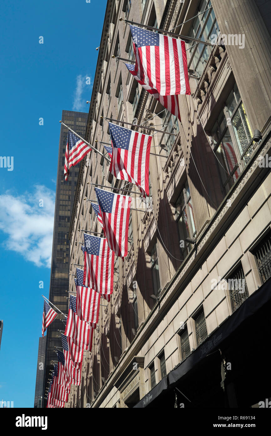 US Flags outside Saks Fifth Avenue Stock Photo