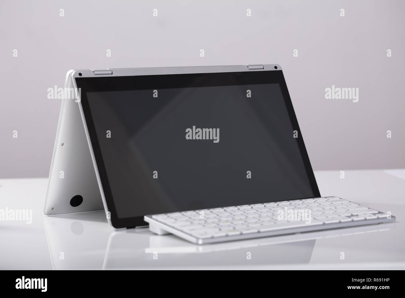 Hybrid Laptop With External Keyboard Over The Desk Stock Photo Alamy