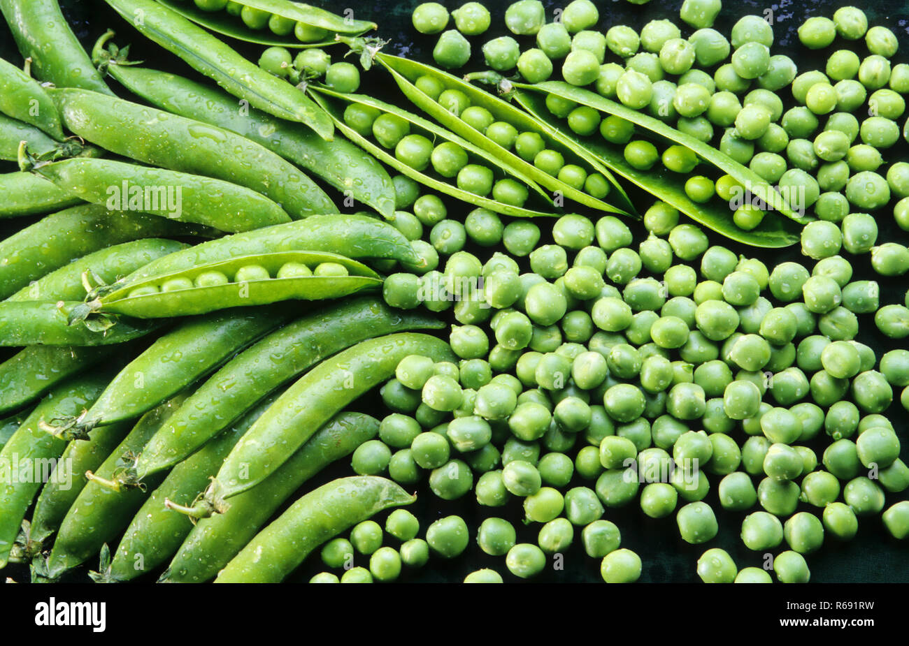 Green peas pods and seeds Stock Photo