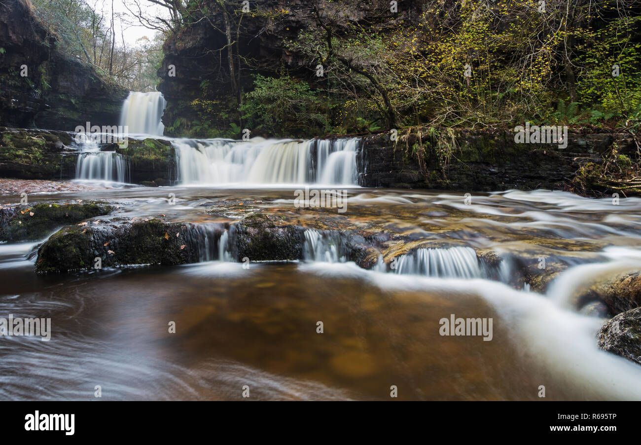 Autumn colours surround Horseshoe Falls, Brecon Beacons Stock Photo