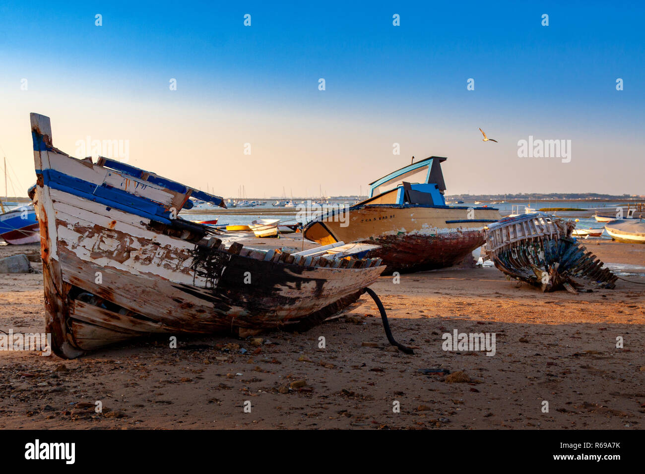 Stranded wooden boats hi-res stock photography and images - Alamy