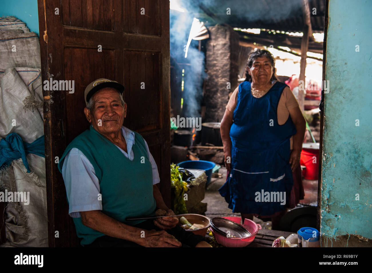 Peruvian marriage poses for a picture in his home in the small town of