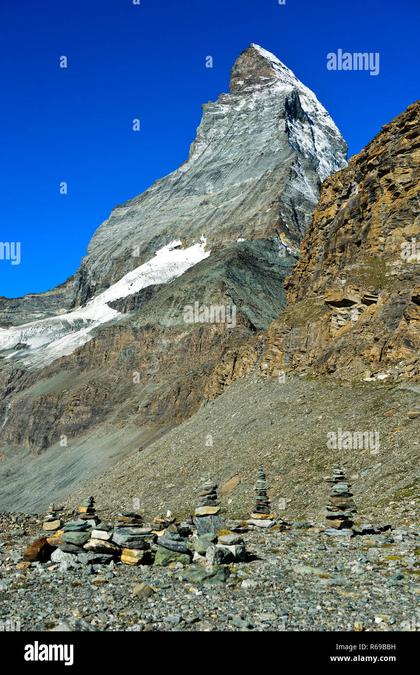 Cairns At The Trail To Hoernlihuette Refuge At The Matterhorn Peak, Zermatt, Valais, Switzerland Stock Photo