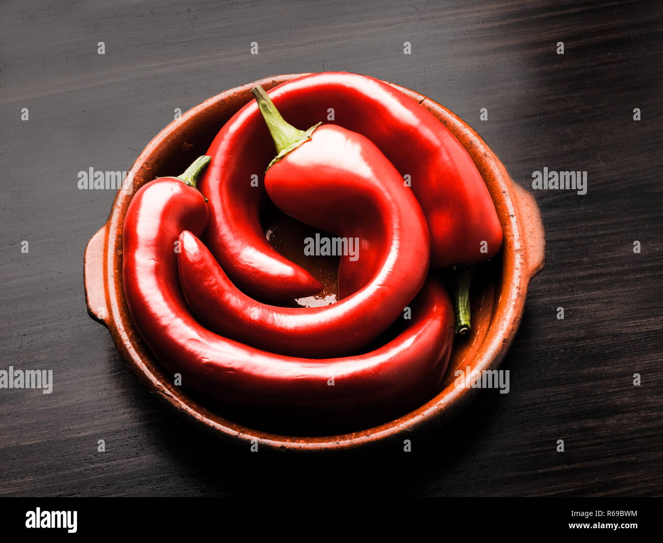 3 Crooked Peppers Paprika In A Bowl On Dark Background Stock Photo Alamy 3 Crooked Peppers Paprika In A Bowl On Dark Background Stock Photo Alamy