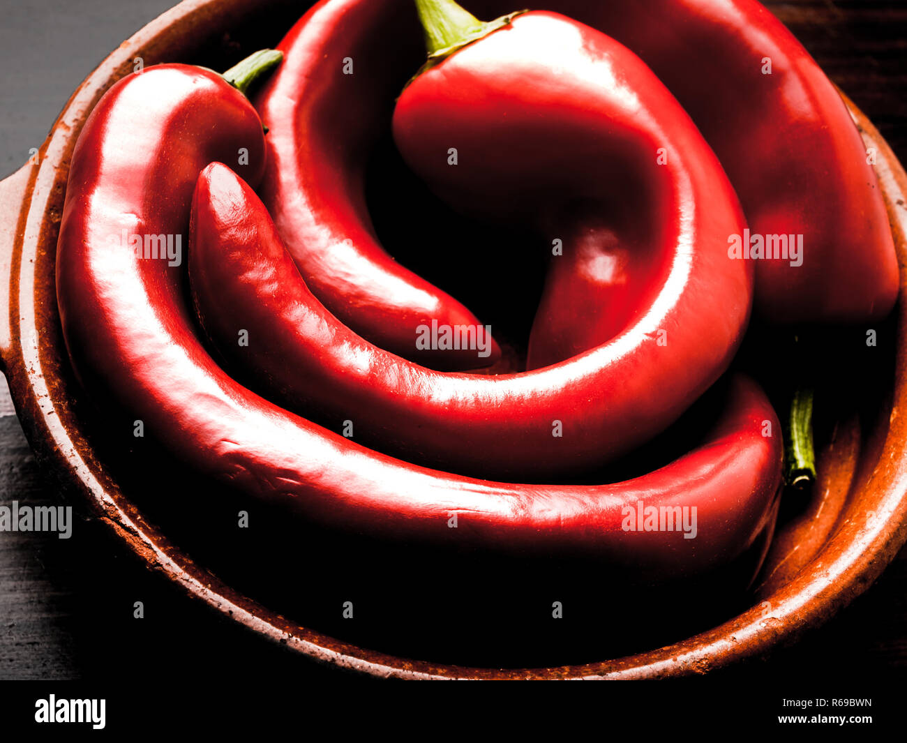 3 Crooked Peppers Paprika In A Bowl On Dark Background Stock Photo Alamy 3 Crooked Peppers Paprika In A Bowl On Dark Background Stock Photo Alamy