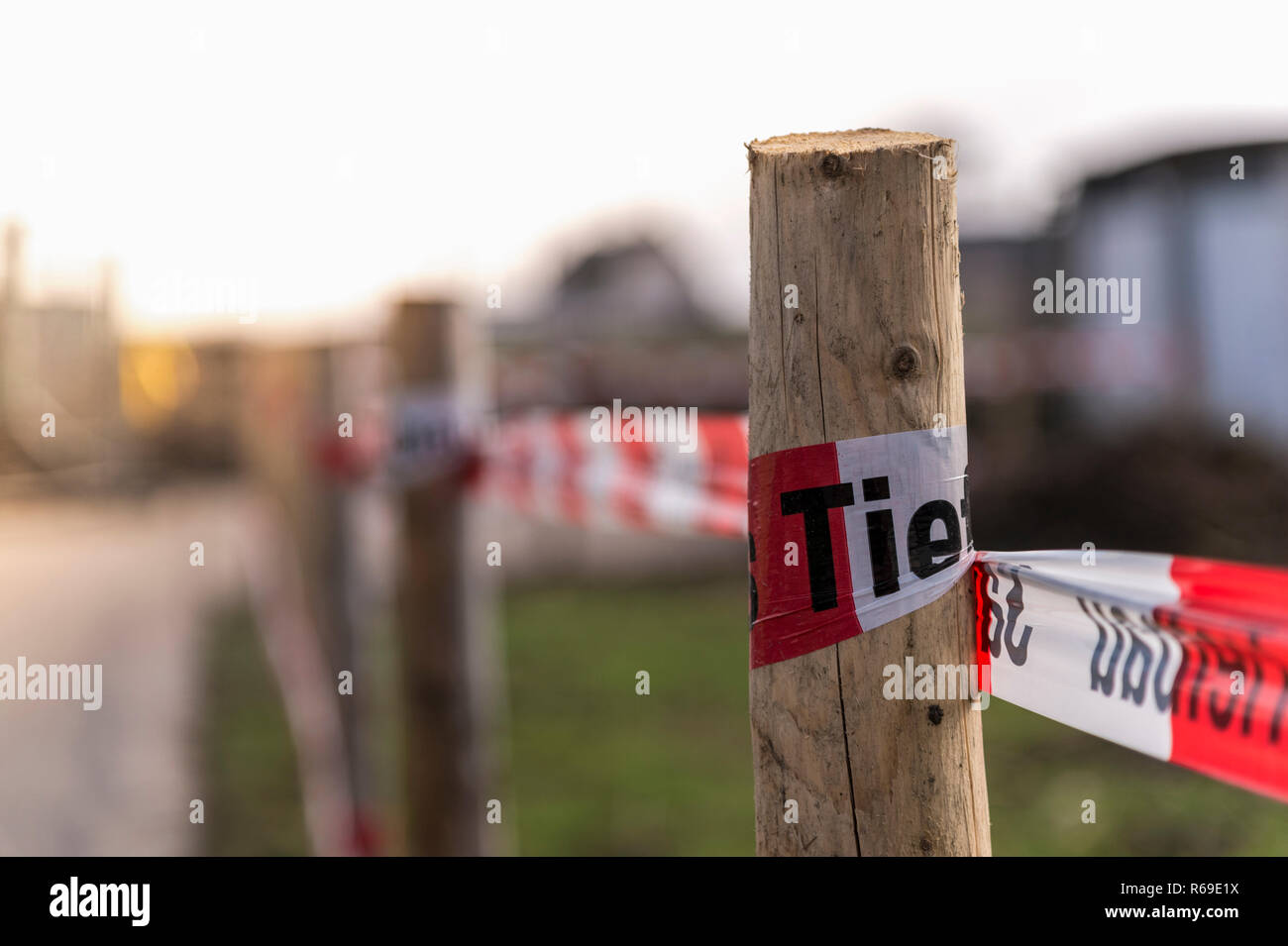 Wooden Posts And Caution Tape At A Construction Site Stock Photo - Alamy