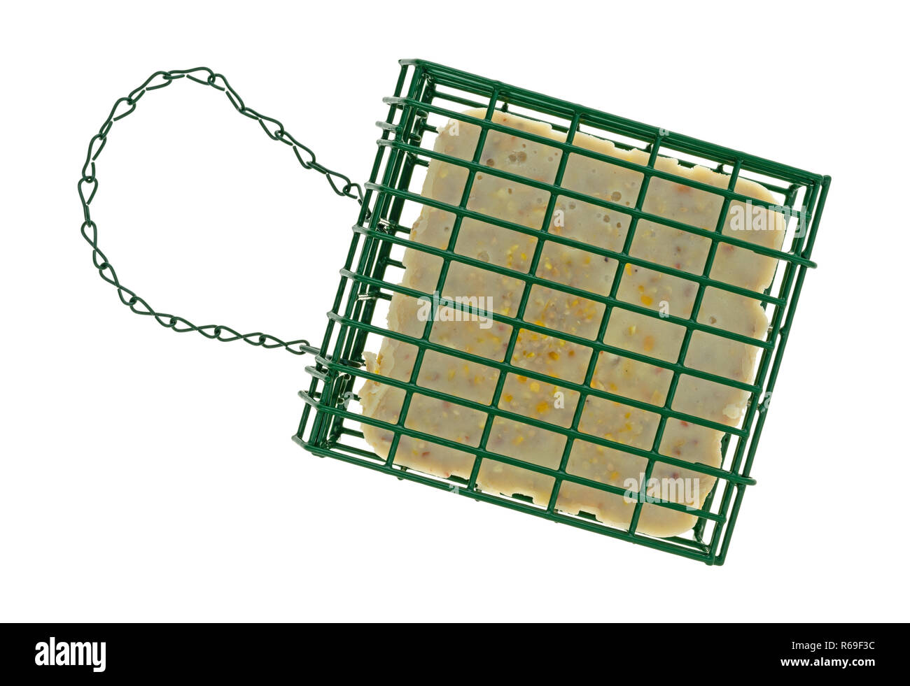 Top view of a suet basket with a cake of suet inside isolated on a white background. Stock Photo