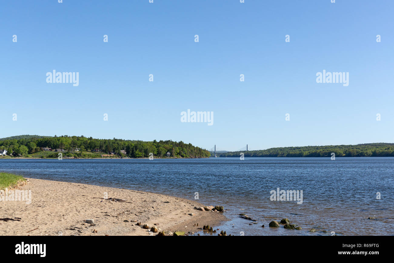 View Sandy Point Beach Park in Stockton Springs, Maine on a bright