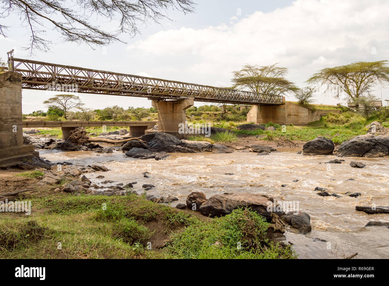 Iron Bridge on the Mara River between Maasai Mara Park in North West Kenya and Serenghetti Park in Tanzania Stock Photo