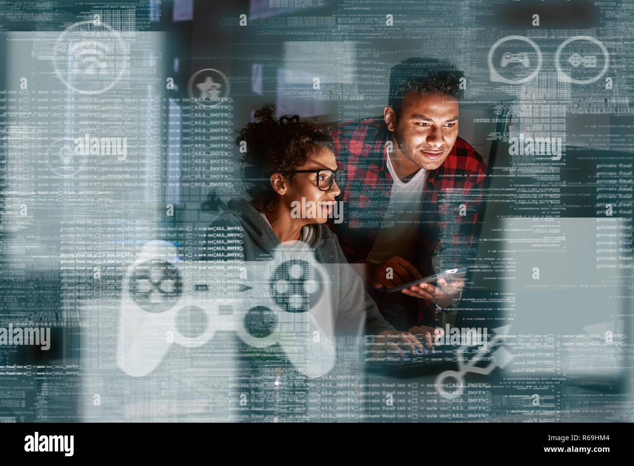 Young indian game developers thinking how to track new events Stock Photo