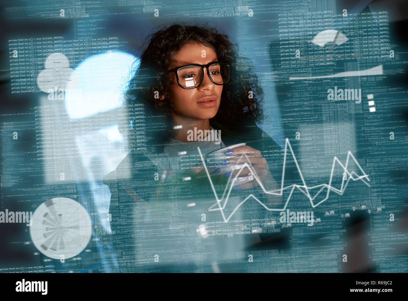 Young woman is thinking about the statistics Stock Photo