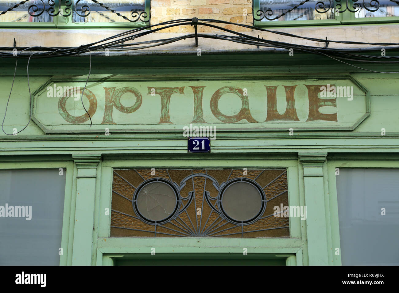 Optician's shop front detail in Rue des Epeers, Saint Omer, Pas de Calais, Hauts de France, France Stock Photo