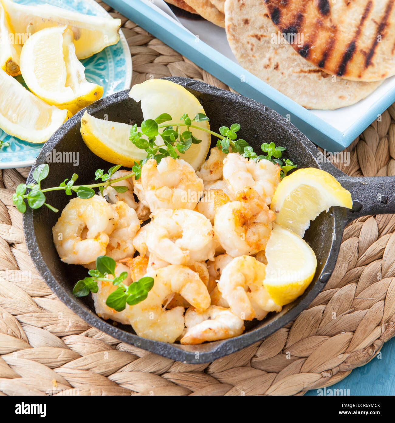 Fried Shrimps With Lemon Stock Photo