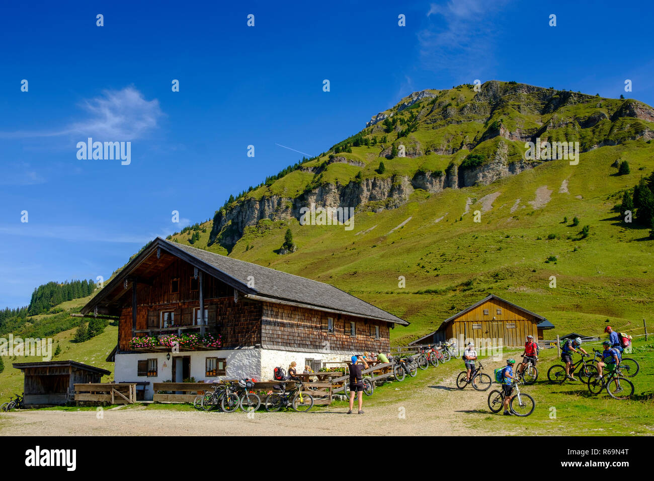 Mountainbiker at Rotwandhütte, Rotwandalm, below Juifen, Tyrol, Austria Stock Photo