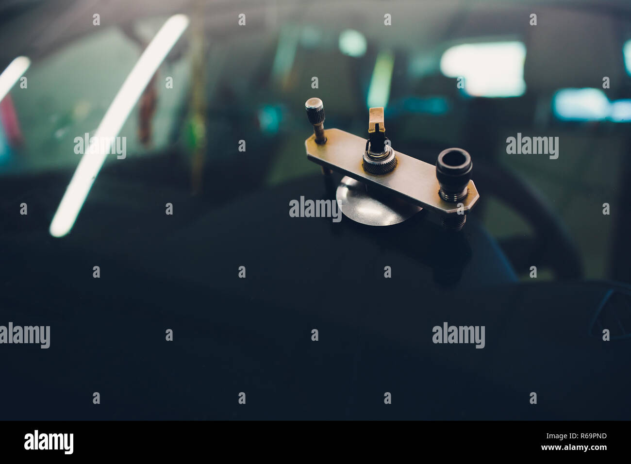 Using tools repairing to fix crack windshield Stock Photo
