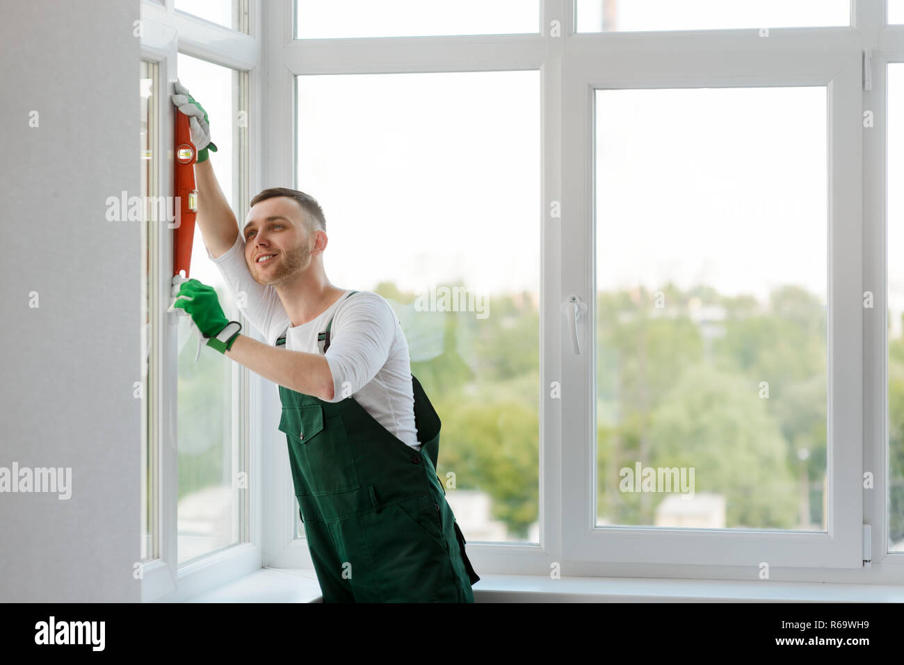 Man is verifying measurements Stock Photo