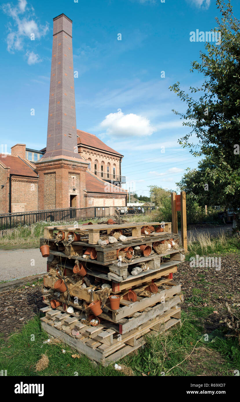 Swift Tower and bug hotel two urban habitats together at Walthamstow Wetlands (Formally Walthamstow Reservoirs). Stock Photo
