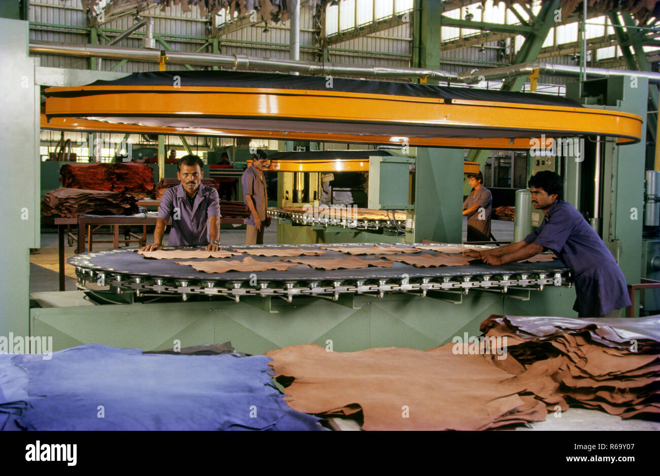 Leather cutting machine, India, Asia Stock Photo