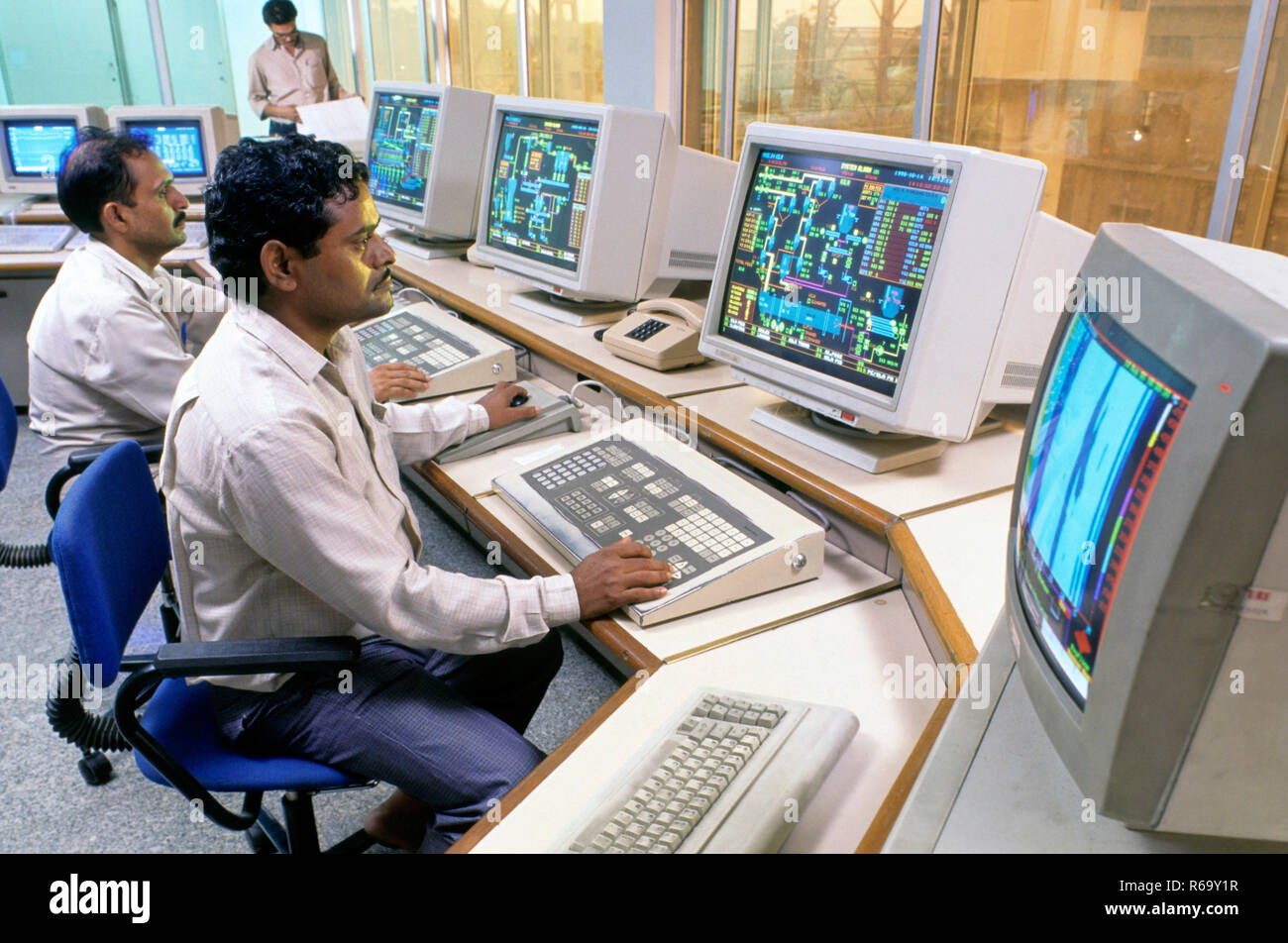 chemical factory process control through computers india Stock Photo