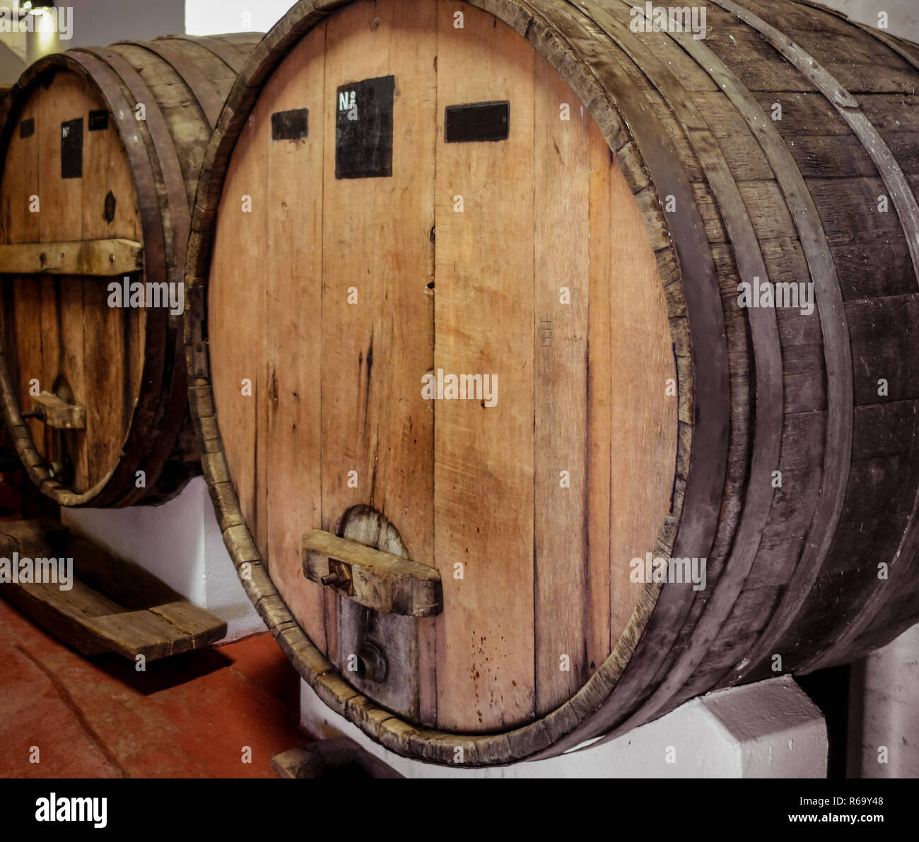 wood wine barrels in a winery Stock Photo Alamy