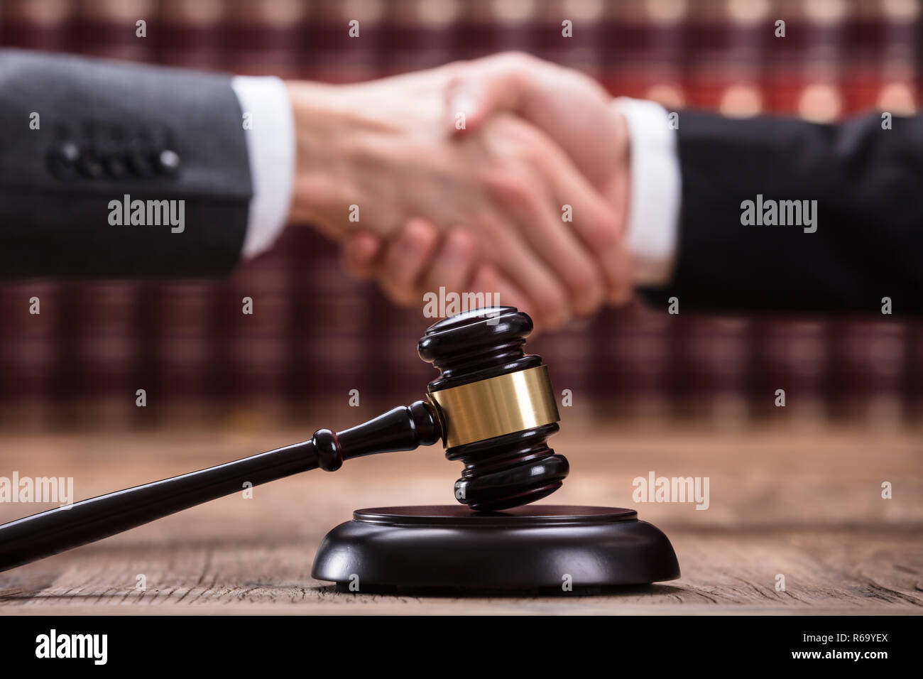 Judge Shaking Hand With Client Stock Photo Alamy