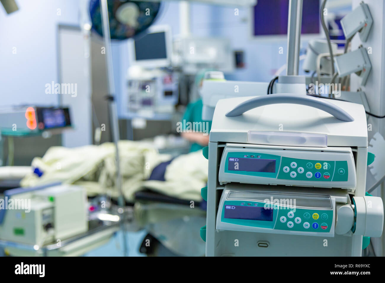 equipment and medical devices in modern operating room take with art lighting and blue filter