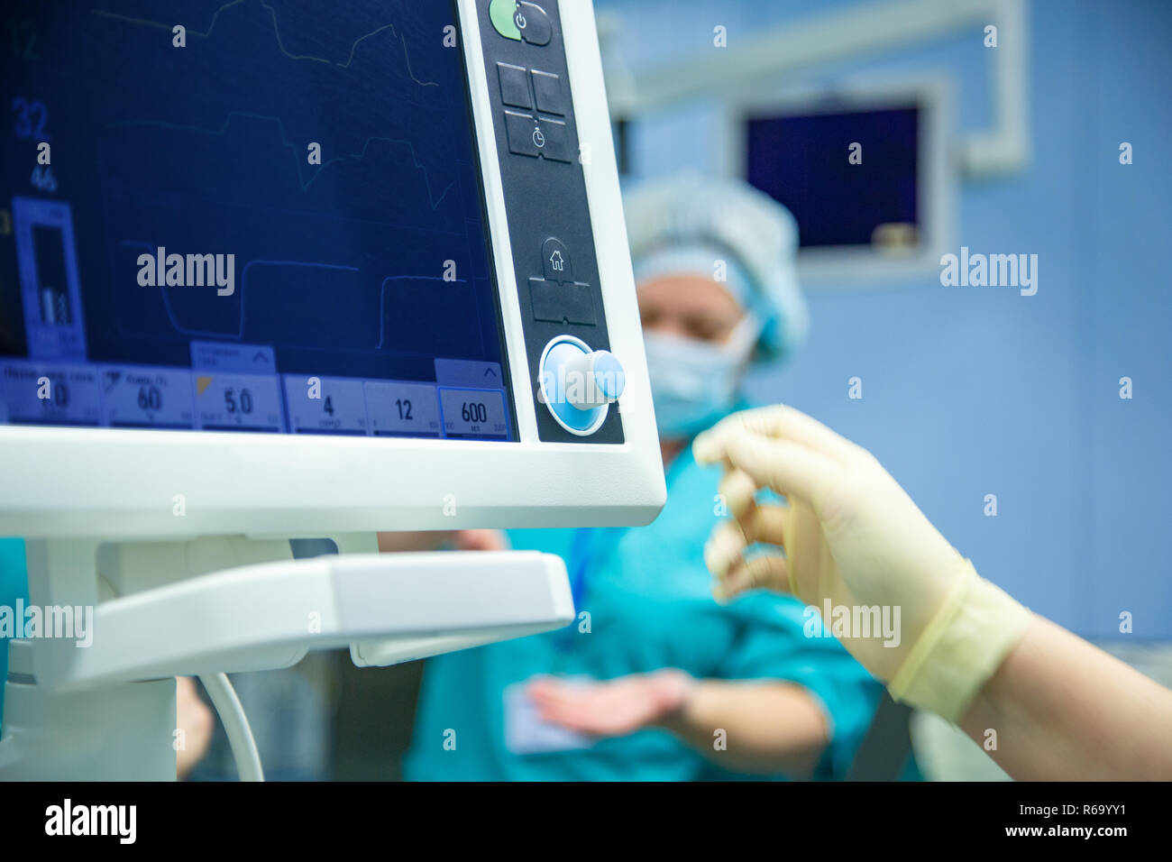 equipment and medical devices in modern operating room take with art lighting and blue filter