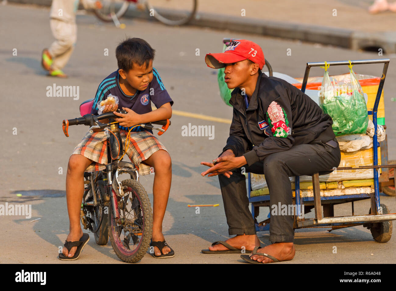 children in the park of the royal palace in Phnom Penh, Cambodia Stock Photo