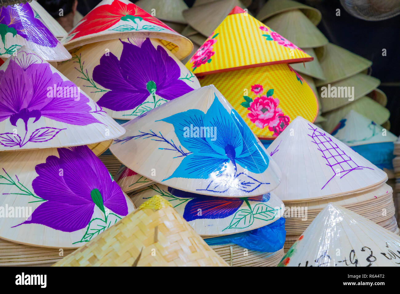 Traditional bamboo hats made on Hue, local market. Souvernir from