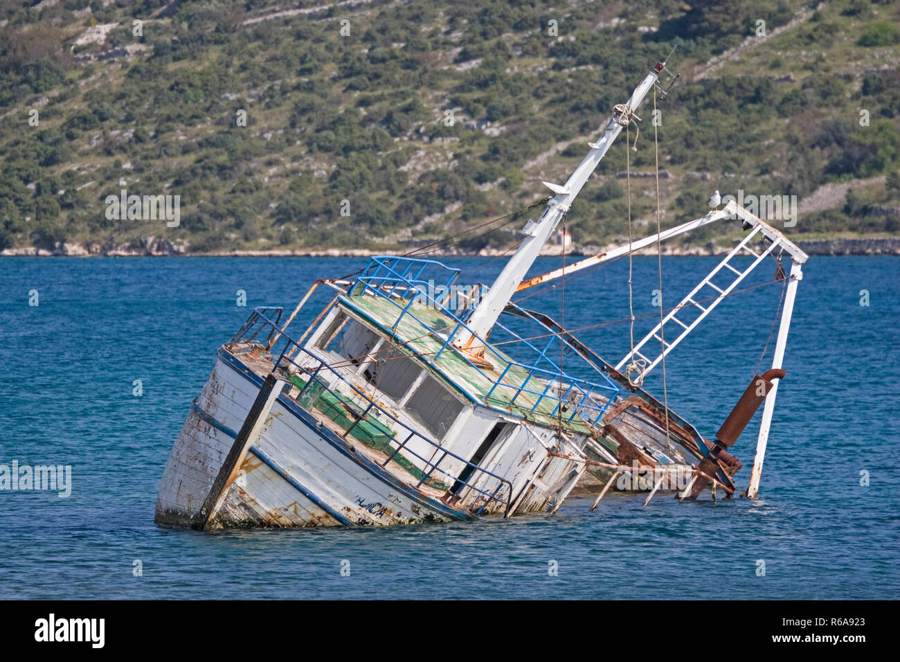 Capsized Trawler In A Bay On The Dalmatian Coast Stock Photo
