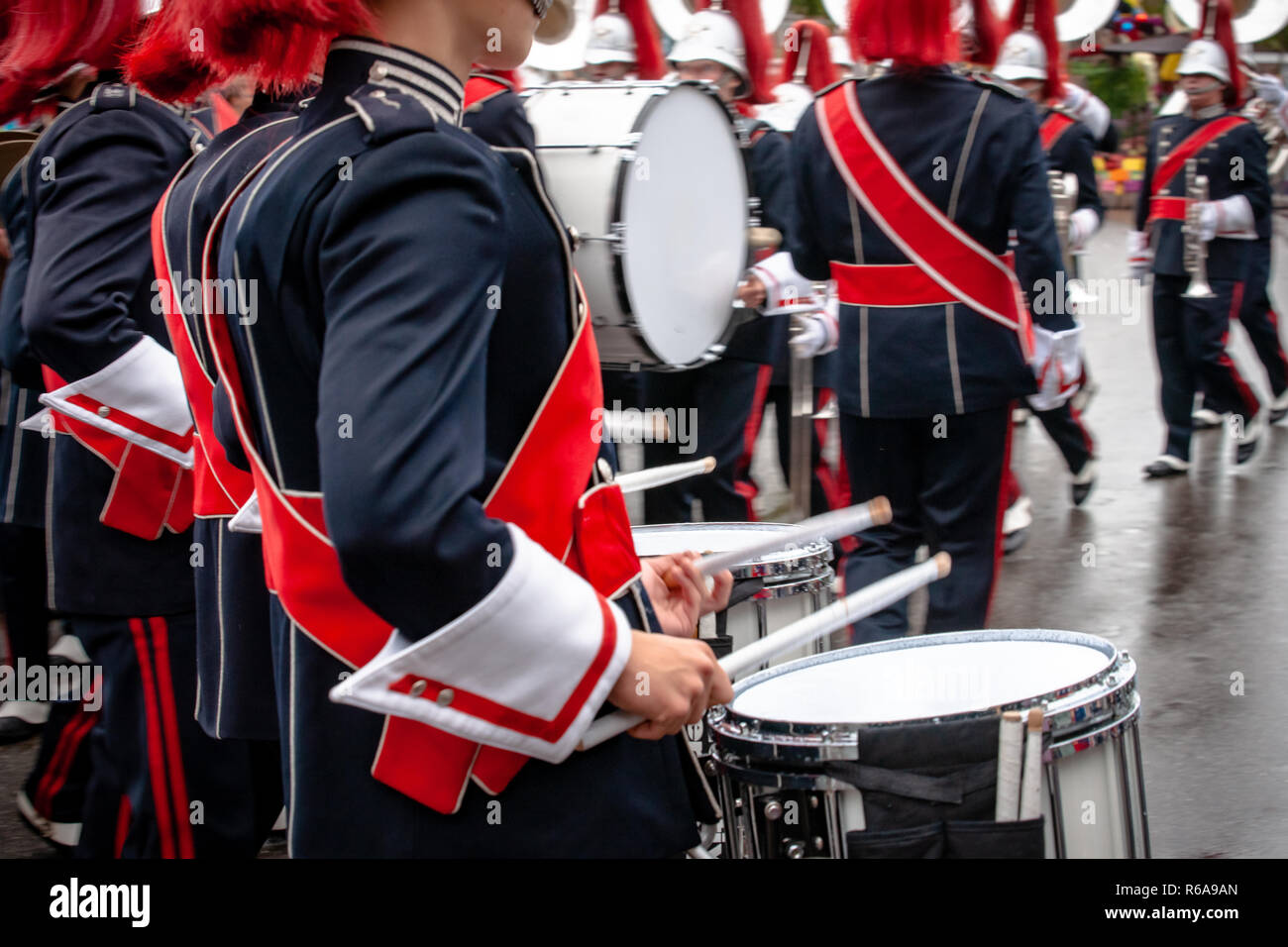 Various details of a performing wind band during a performance or