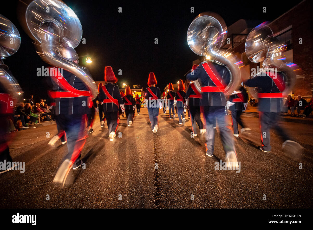 Various details of a performing wind band during a performance or